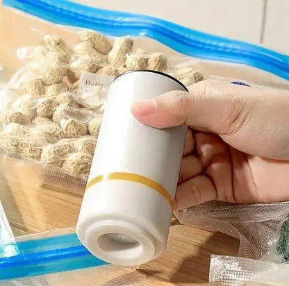 Преносима машинка за вакуумиране + 10 броя плик